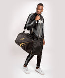 Venum Trainer Lite Evo Sports Bags - Black/Gold